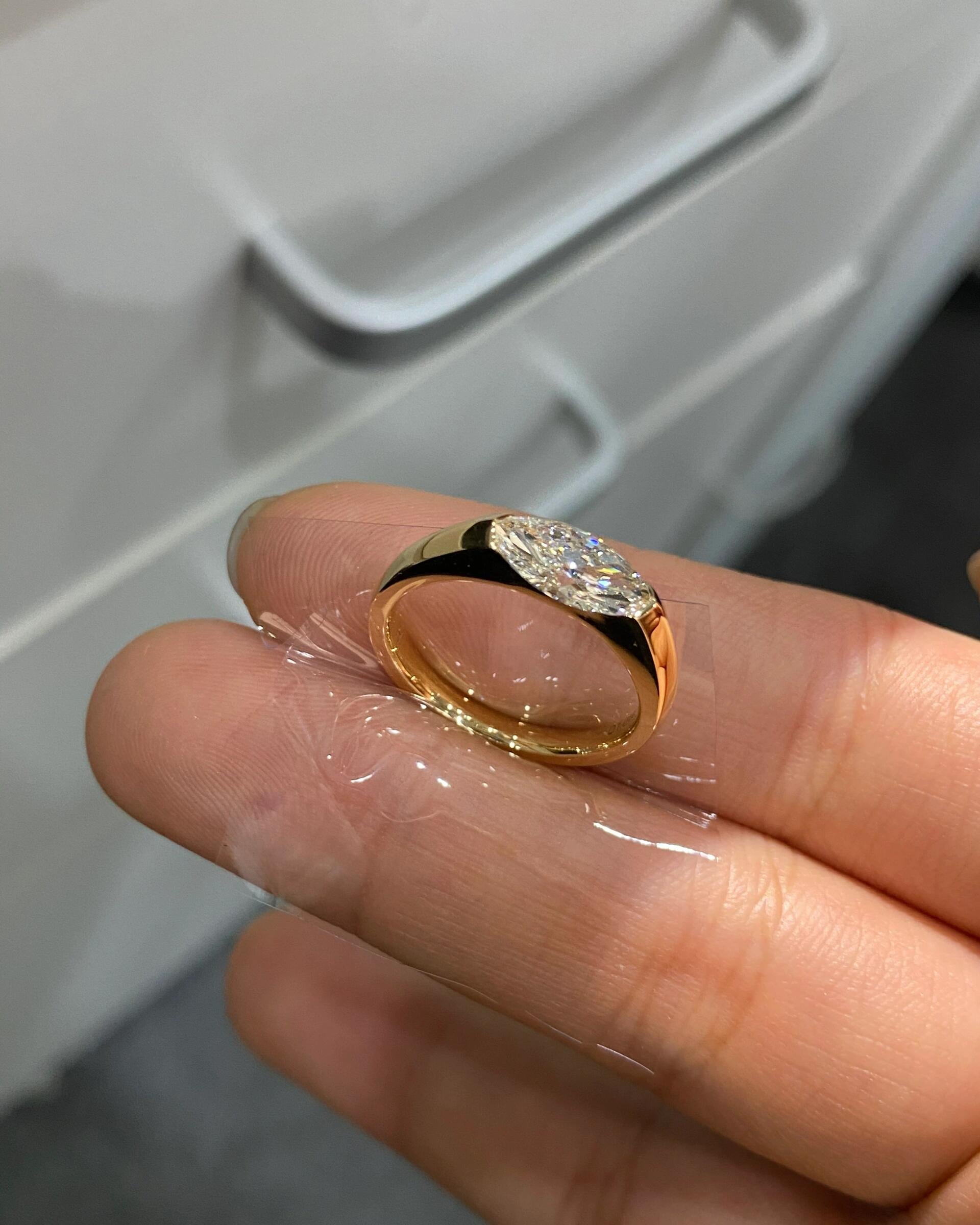 A magnificent Marquise-cut engagement ring featuring a dazzling lab-grown diamond—Color D, Clarity VS1.