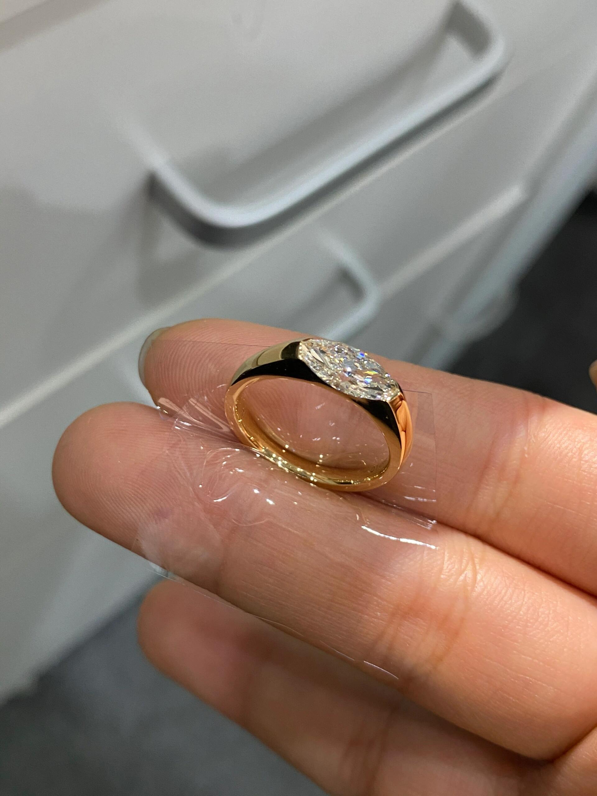 A magnificent Marquise-cut engagement ring featuring a dazzling lab-grown diamond—Color D, Clarity VS1.