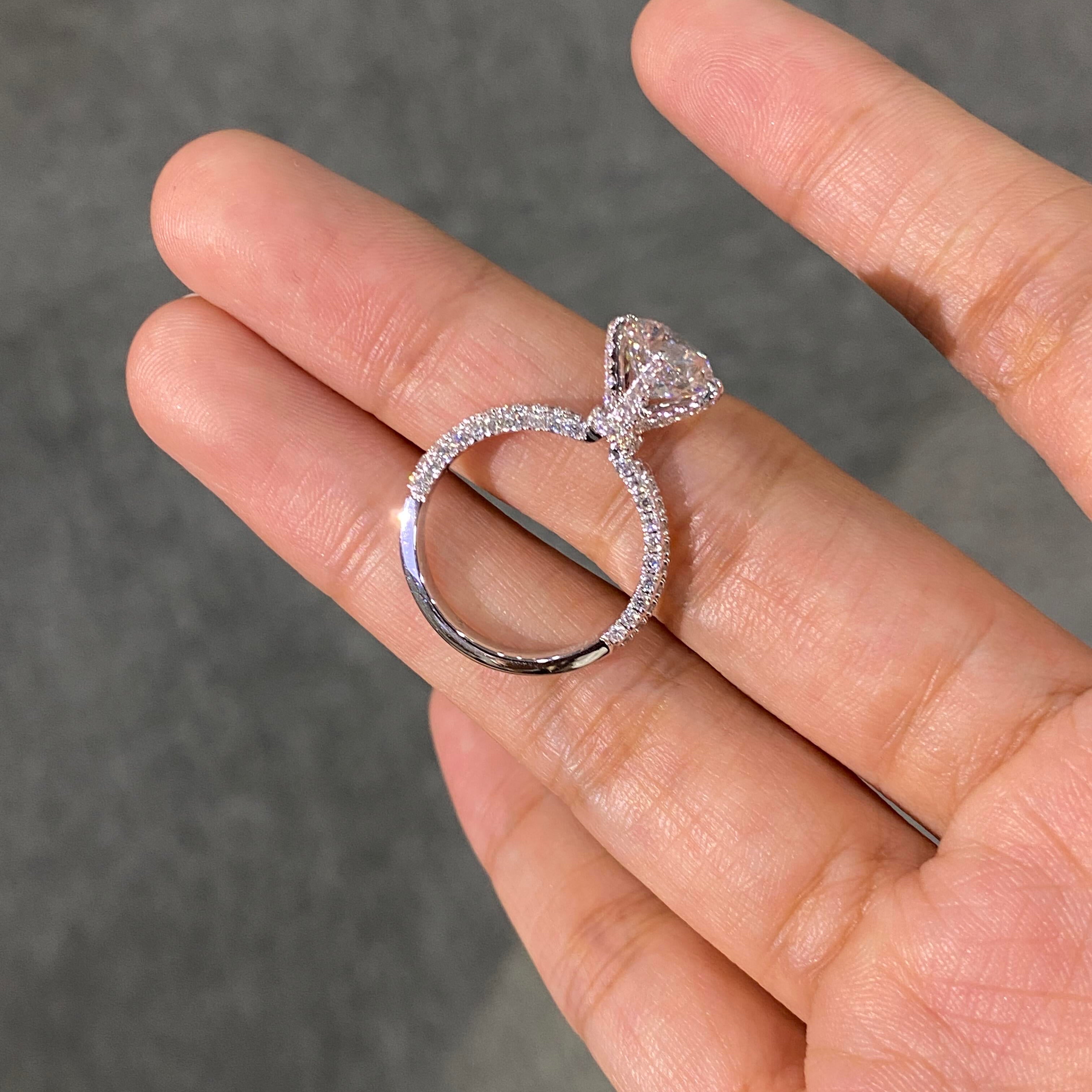 Four-Prong Set, Round Lab-Grown Diamond Ring—Radiating Brilliant Luster, Featuring D Color and VS1 Clarity.