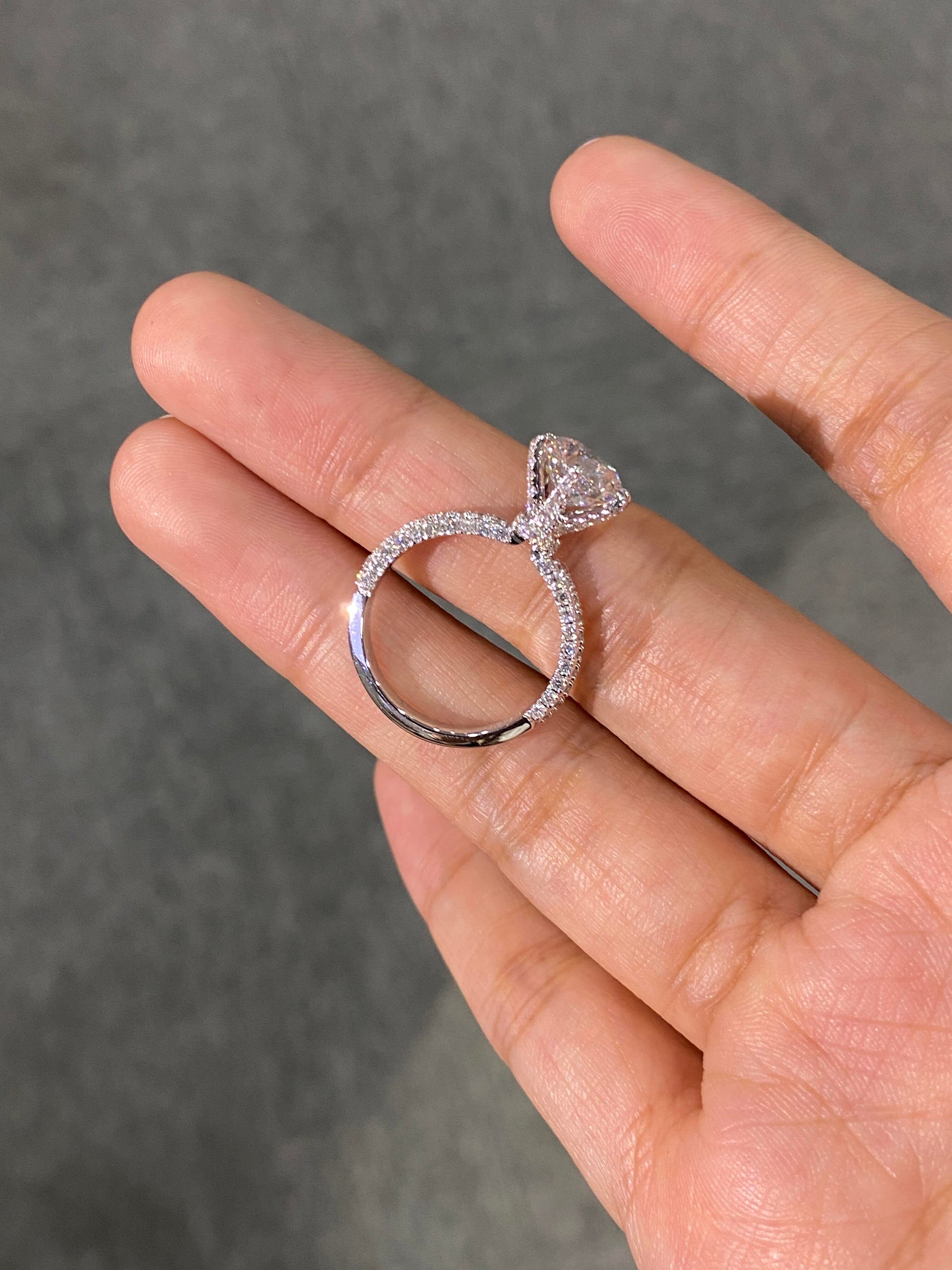 Four-Prong Set, Round Lab-Grown Diamond Ring—Radiating Brilliant Luster, Featuring D Color and VS1 Clarity.