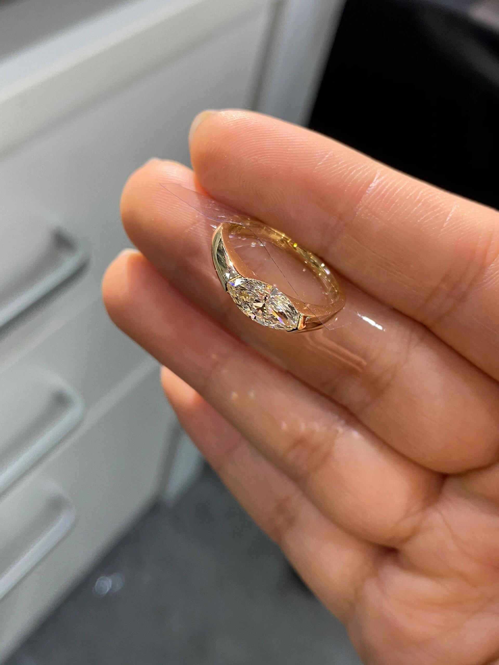 A magnificent Marquise-cut engagement ring featuring a dazzling lab-grown diamond—Color D, Clarity VS1.