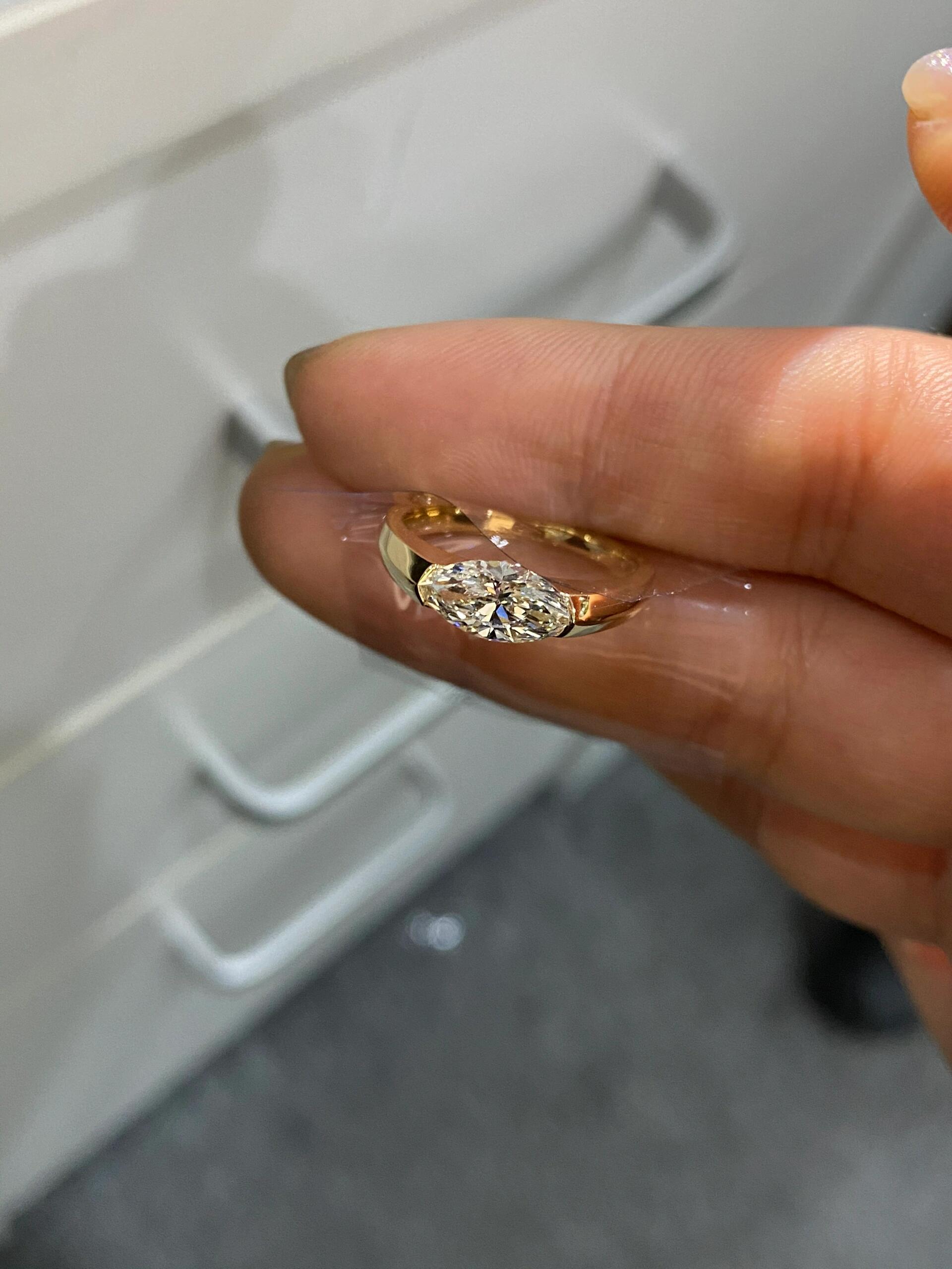 A magnificent Marquise-cut engagement ring featuring a dazzling lab-grown diamond—Color D, Clarity VS1.