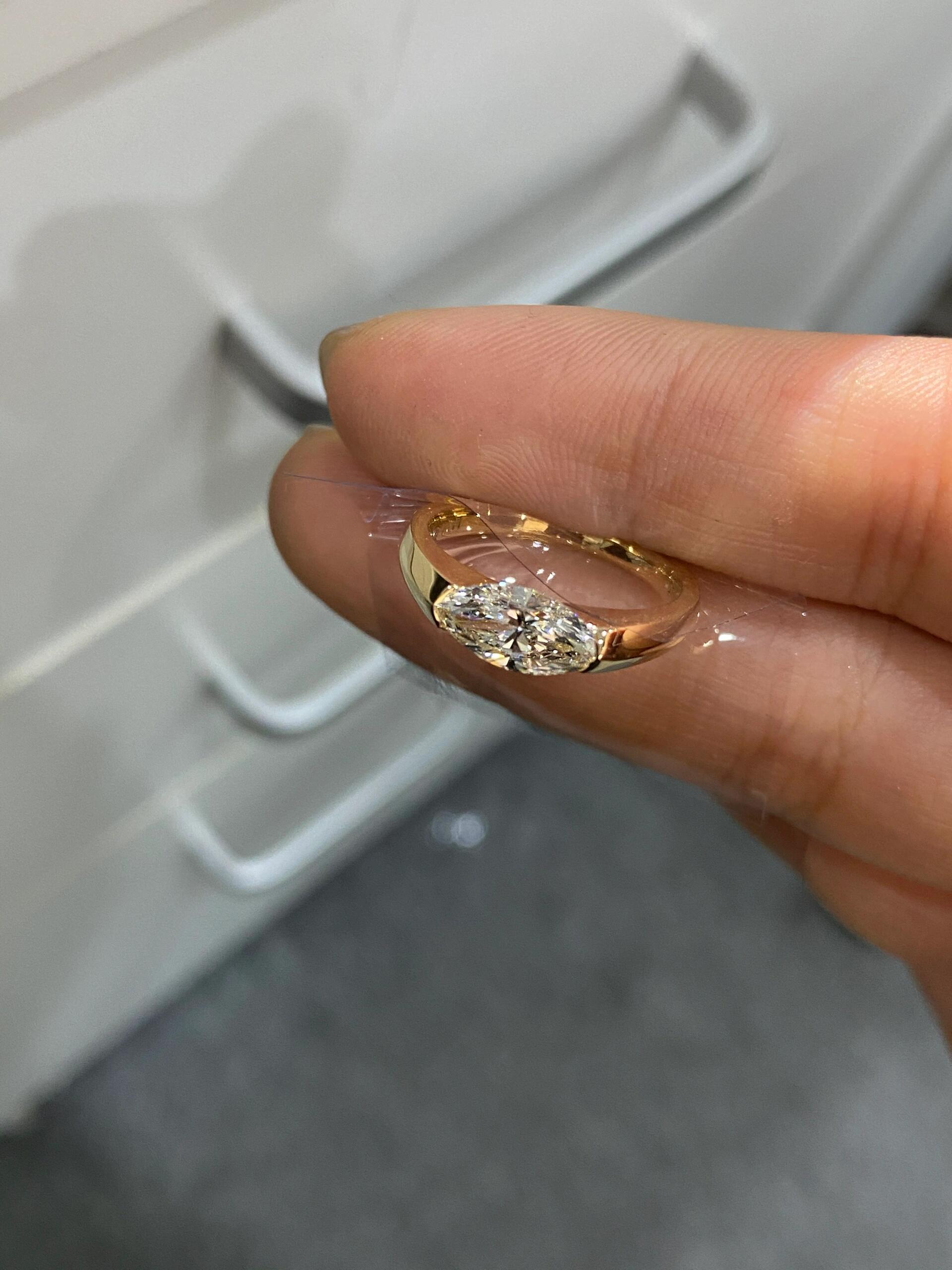 A magnificent Marquise-cut engagement ring featuring a dazzling lab-grown diamond—Color D, Clarity VS1.
